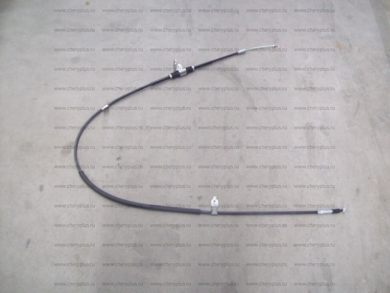 Трос стояночного тормоза лев 1064001076